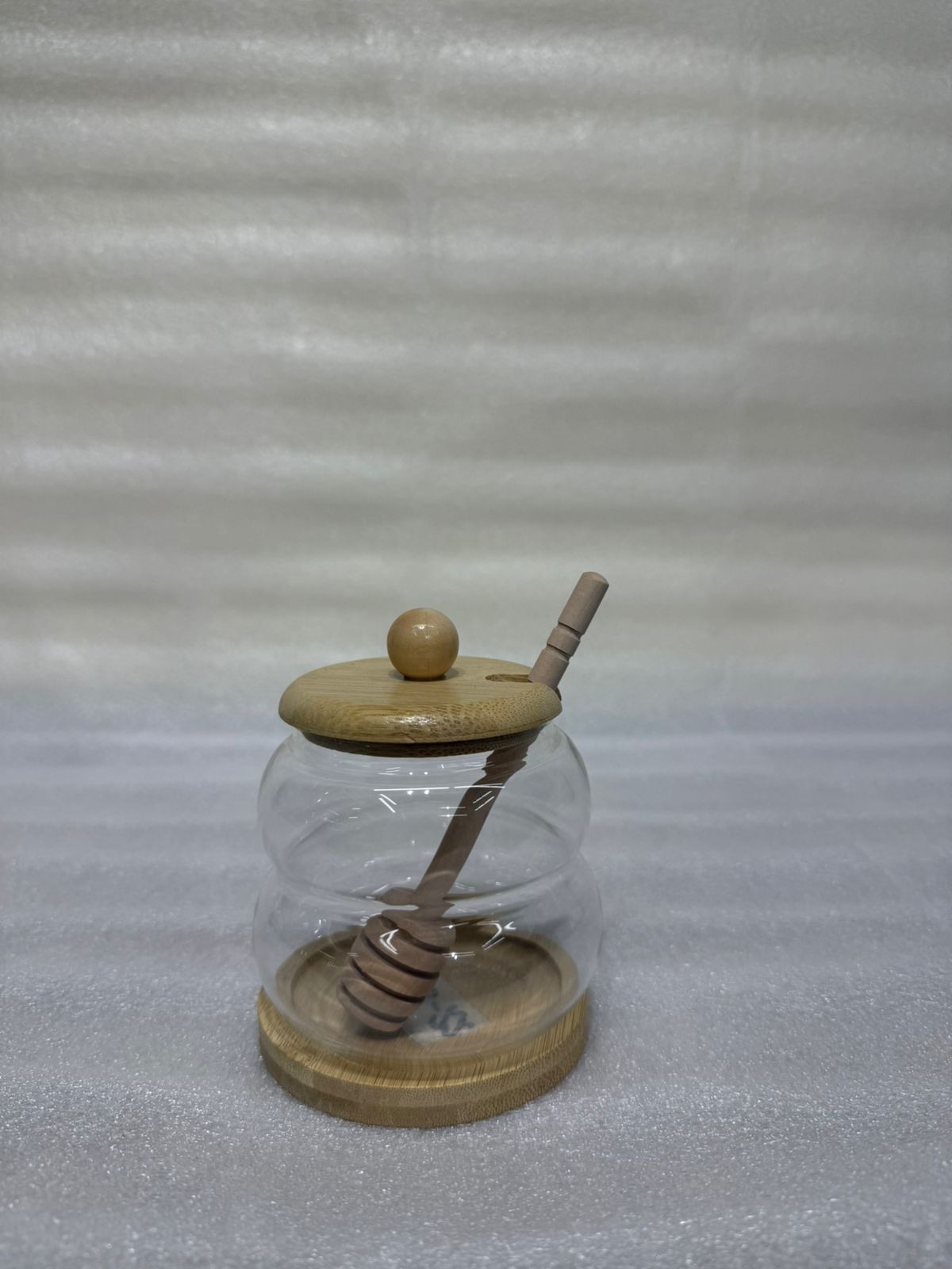 Elegant Glass Honey Storage Container with Wooden Dipper Stick