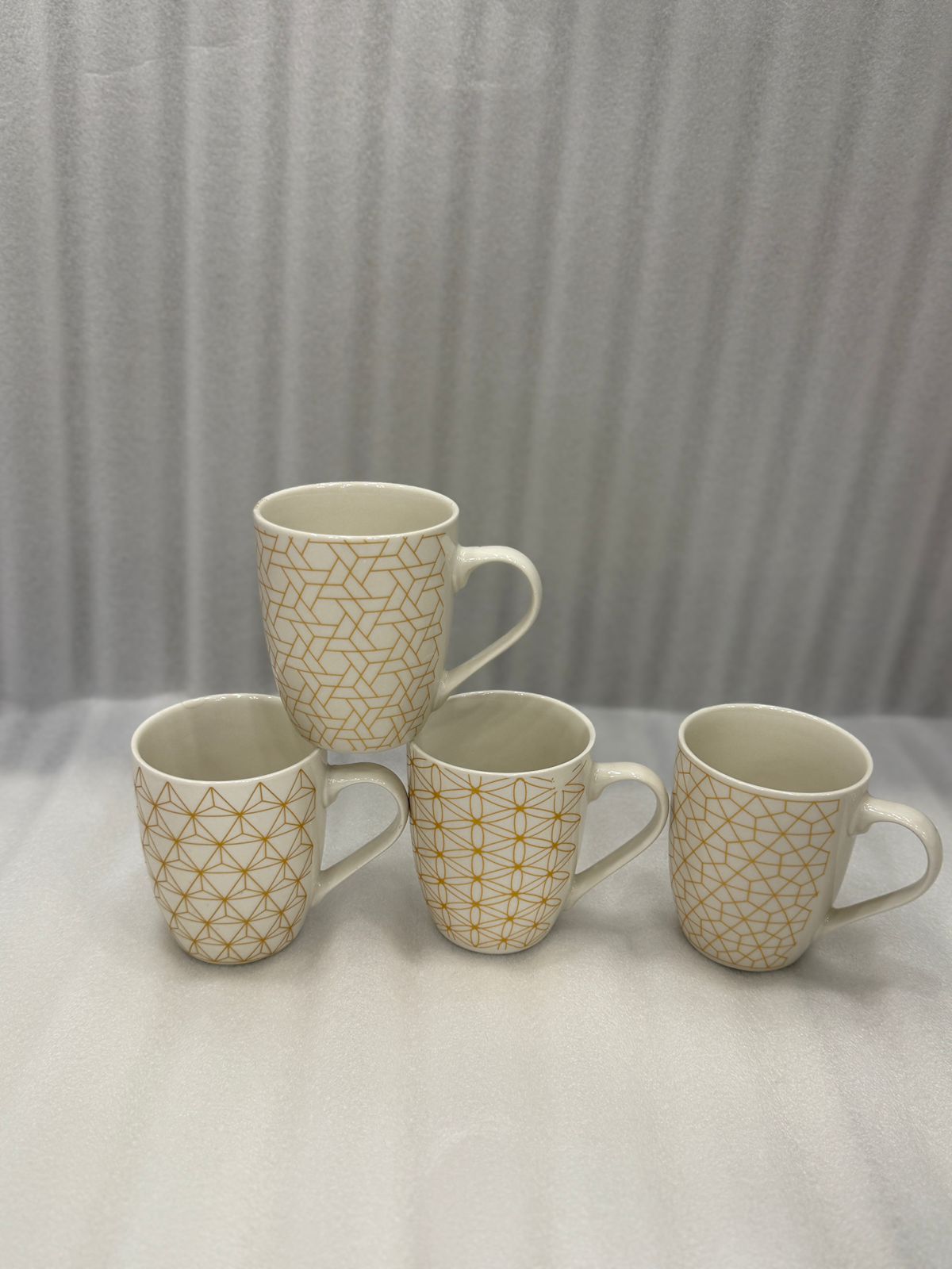 Minimalist White Porcelain Tea Cups with Gold Line Art Patterns