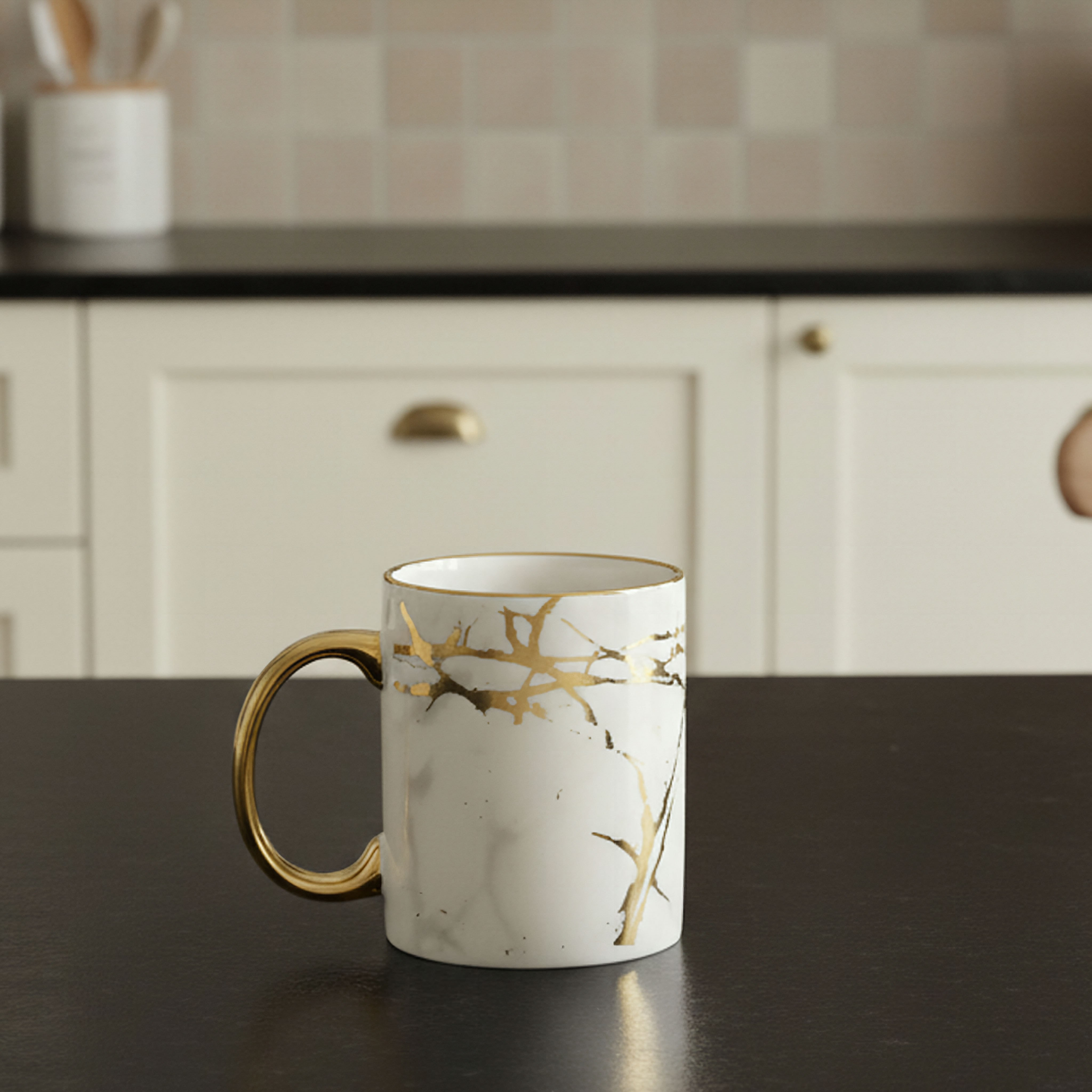Elegant White and Gold Porcelain Tea Cups with Metallic Handles