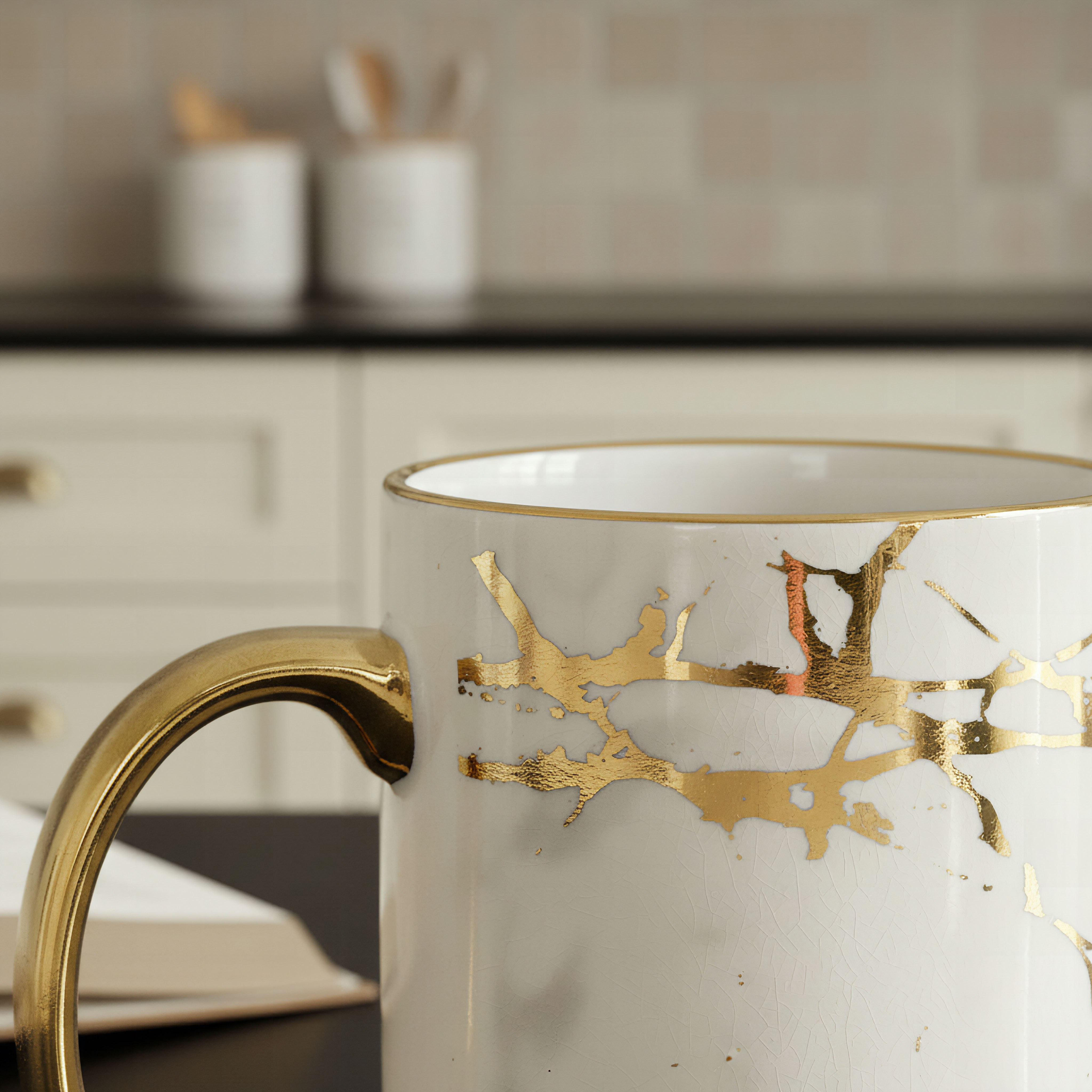 Elegant White and Gold Porcelain Tea Cups with Metallic Handles